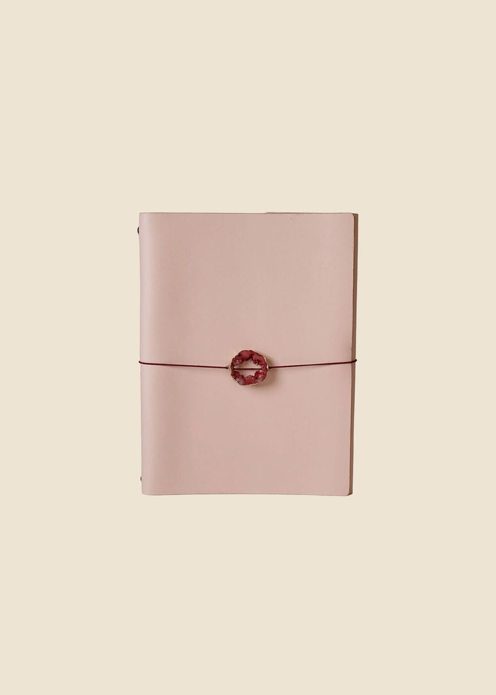 Oxford large leather journal held in hand in light pink leather