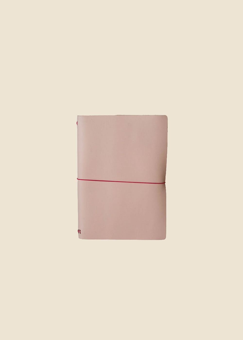 Heatherfield A6 leather journal in Light Pink leather with wrap cord