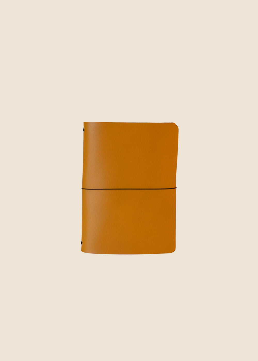 Heatherfield A6 leather journal in Saffron leather with elastic cord