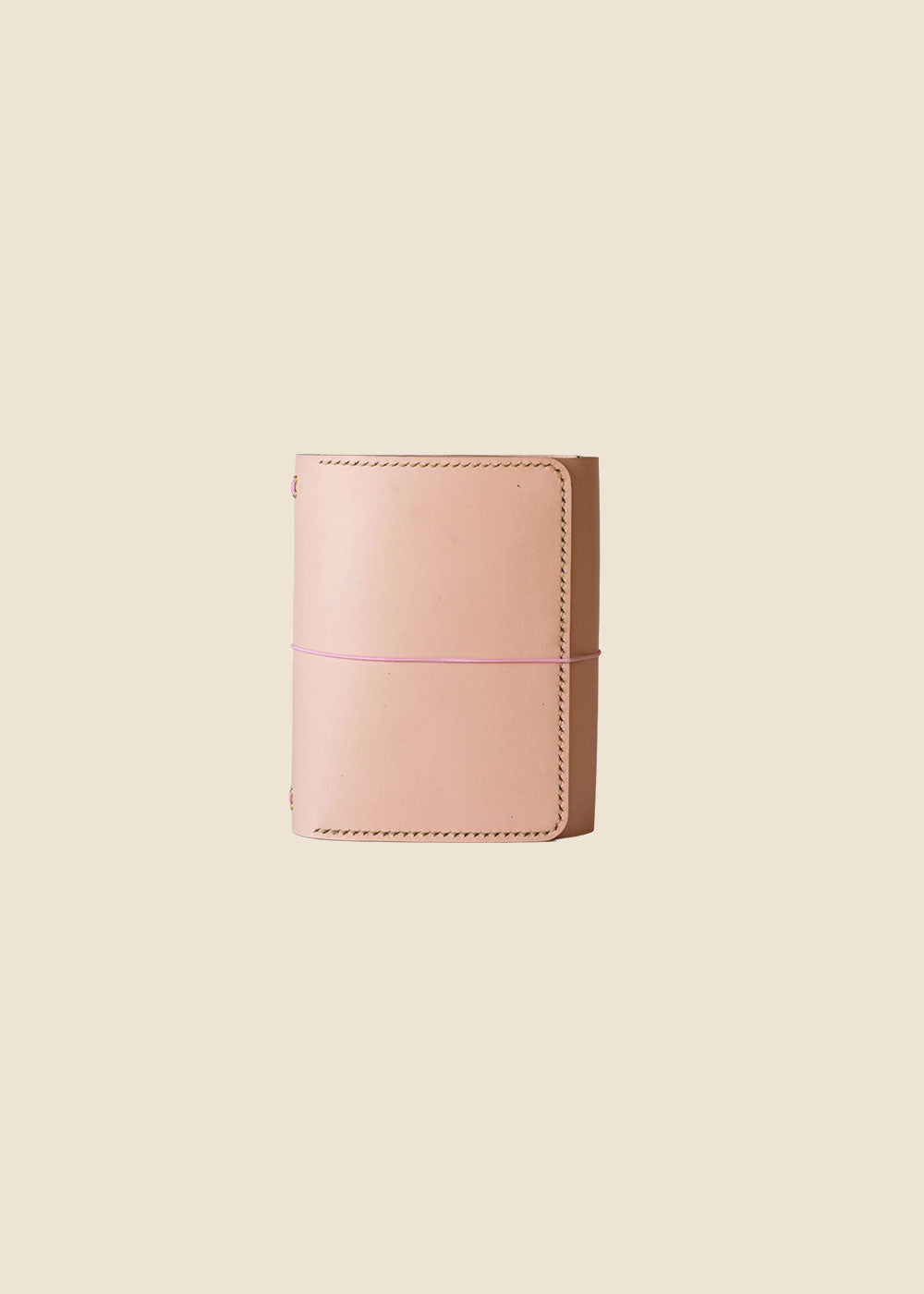 Heatherfield A6 leather journal in Light Pink leather with wrap cord