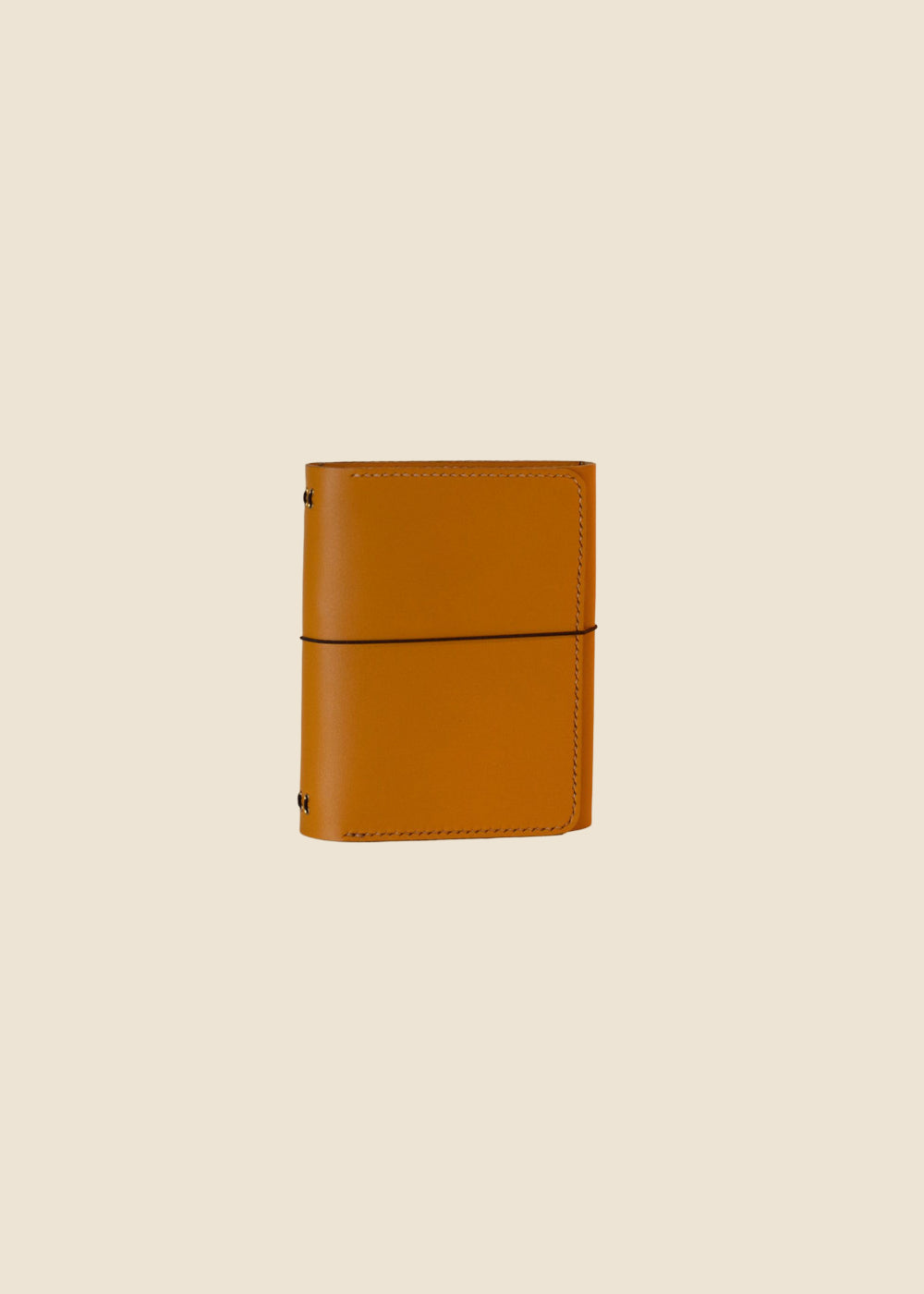 Heatherfield A6 leather journal in Saffron leather with elastic cord